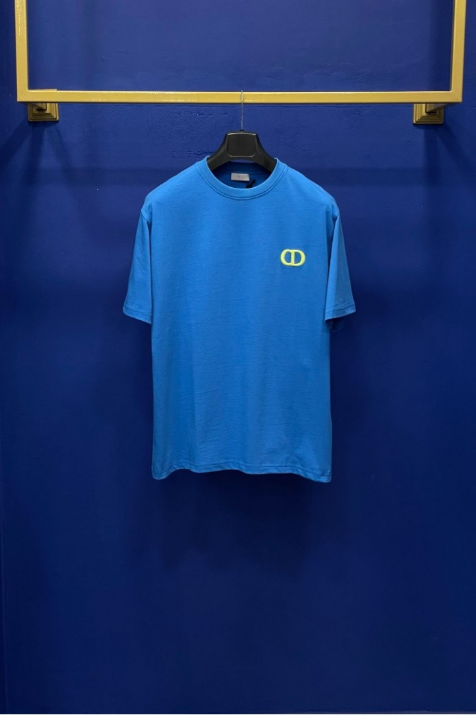 Dior CD Green Logo On A Light Blue