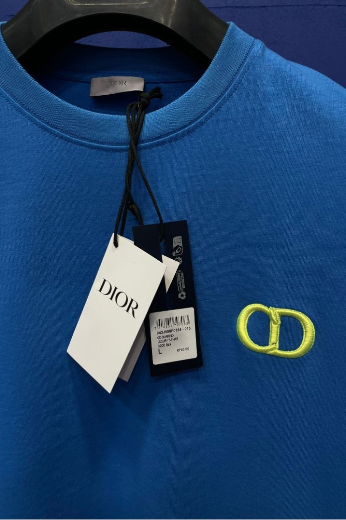 Dior CD Green Logo On A Light Blue